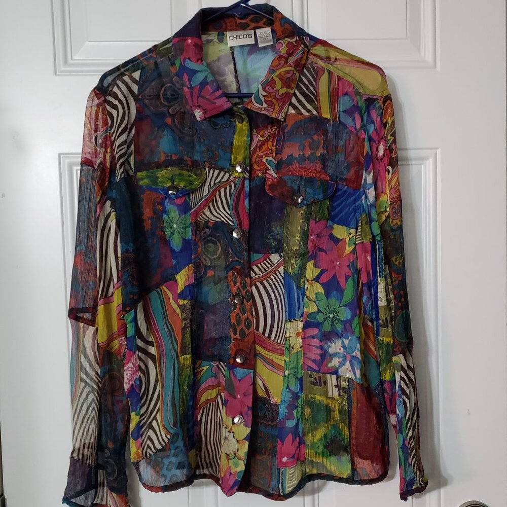91% silk. Button front Top from CHICOS ,size 2 ,Sheer.Bold colors